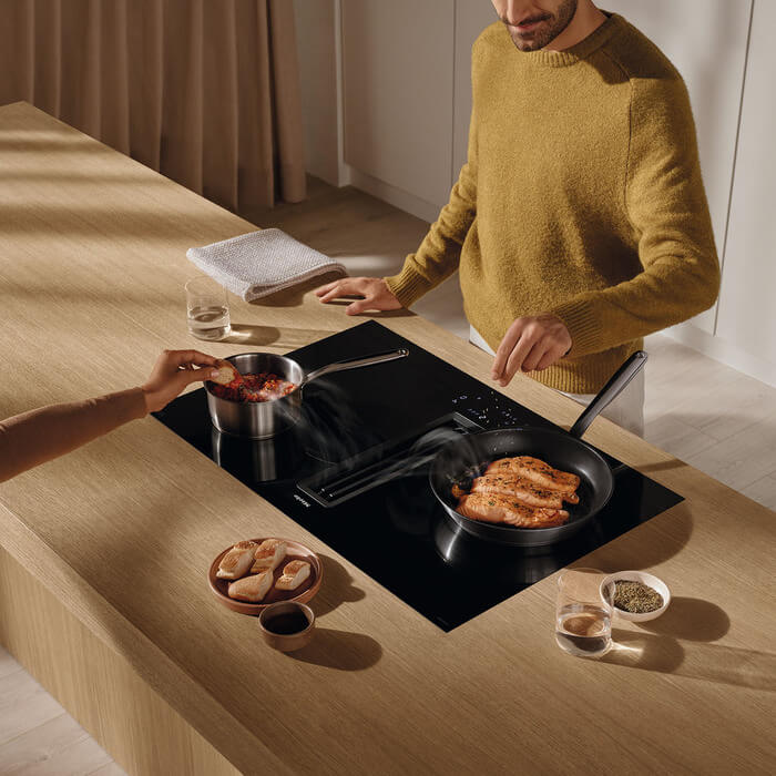 Fluisterstil koken met power: Miele kookplaten met afzuiging