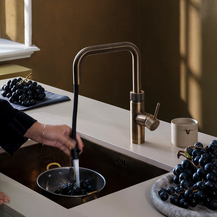 Quooker Flex is er nu ook in messing patina